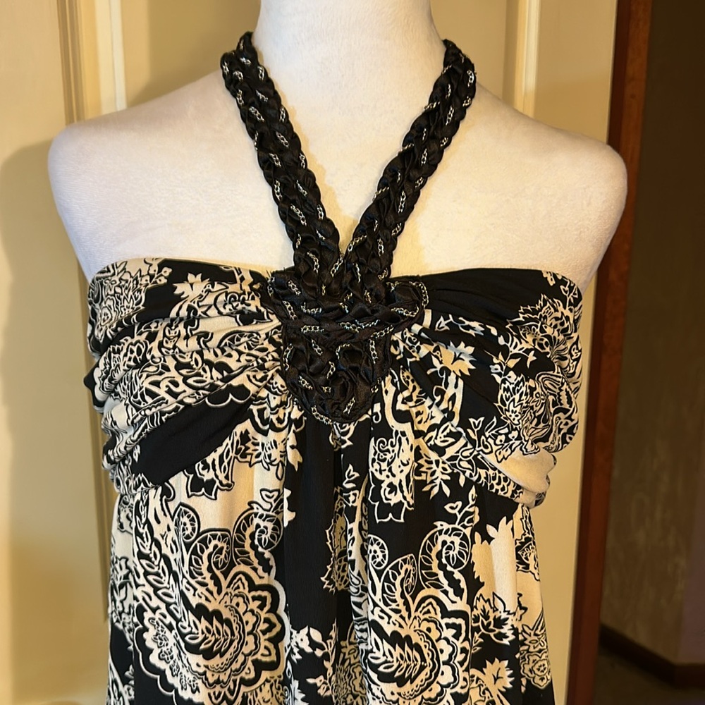 Black & white braided rope ties around the neck worn once